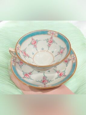 vintage 1900 Minton Persian Rose pattern porcelain teacup and saucer.